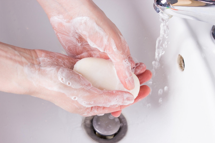 hygiene and health care. closeup woman washing her hands with soap